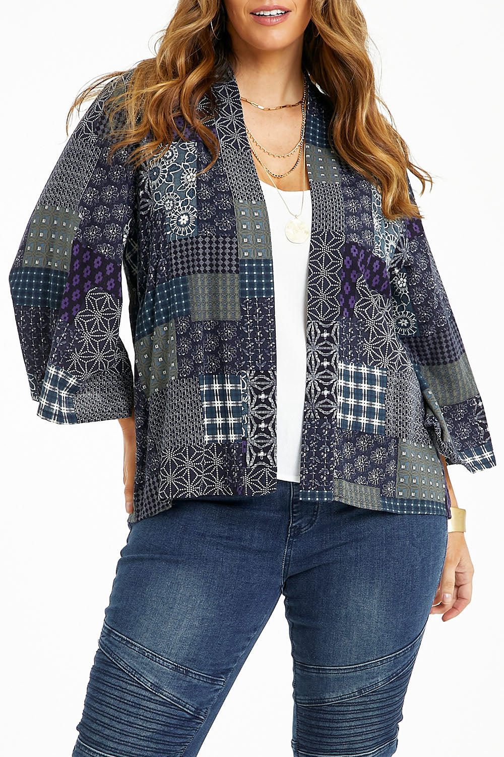 Model Laura wearing size 14 of the You Colour My World Kimono in colour Patch (Blue), from the front, cropped image