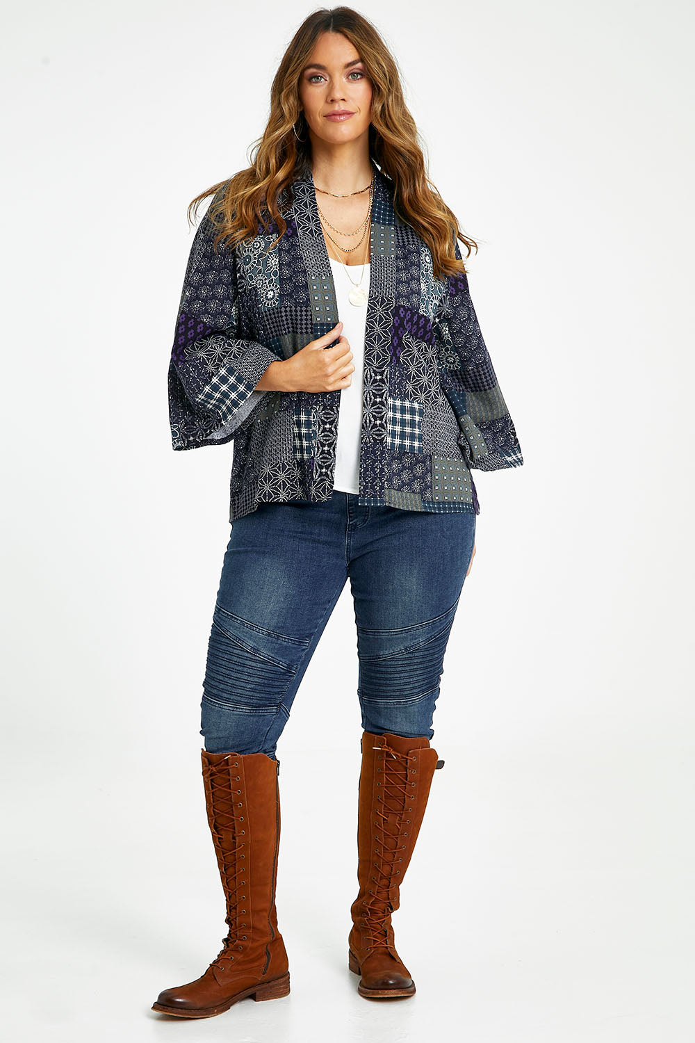 Model Laura wearing size 14 of the You Colour My World Kimono in colour Patch (Blue), from the front, showing the whole outfit