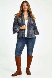 Model Laura wearing size 14 of the You Colour My World Kimono in colour Patch (Blue), from the front, showing the whole outfit