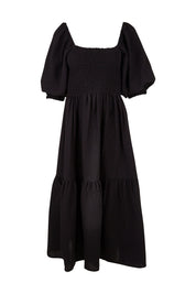 Product shot of the Wandering In Fields Organic Cotton Dress in colour Black (Black), from the front