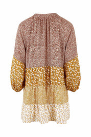 Product shot of the Cruising On By Tiered Blouse in colour Fleur, from the back