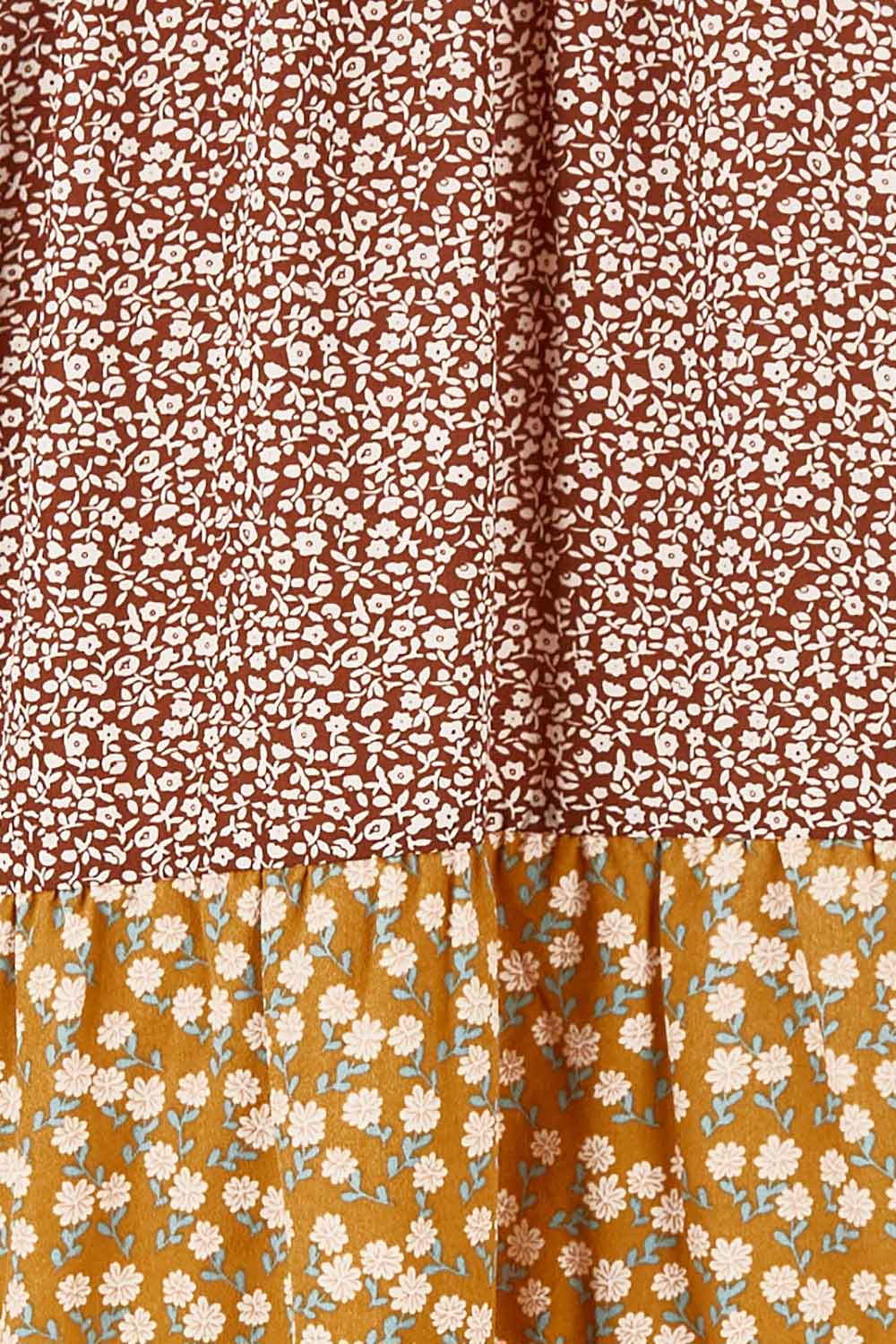 Product shot of the Cruising On By Tiered Blouse in colour Fleur, detail