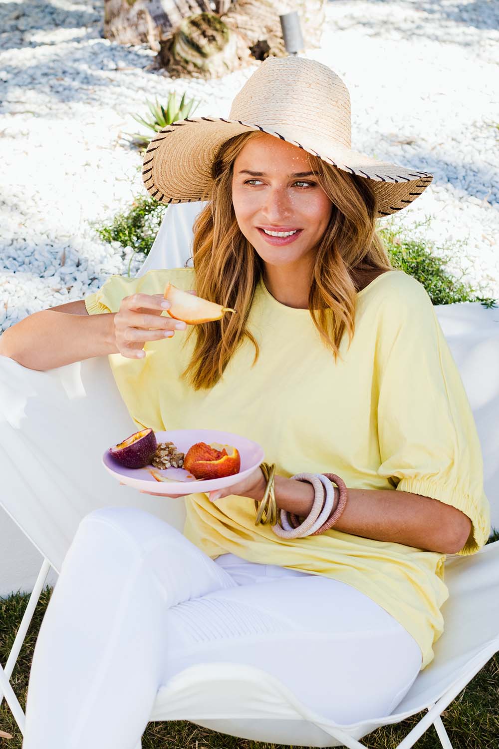 Model Ilona wearing size 10 of the In My Arms Tee in colour Sunshine, from the front, showing the whole outfit