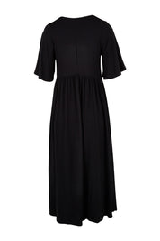Product shot of the Swinging Hands With You Dress in colour Black (Black), from the back