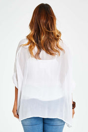 Model Laura wearing size 14 of the You See Through Me Blouse in colour White (White), from the back