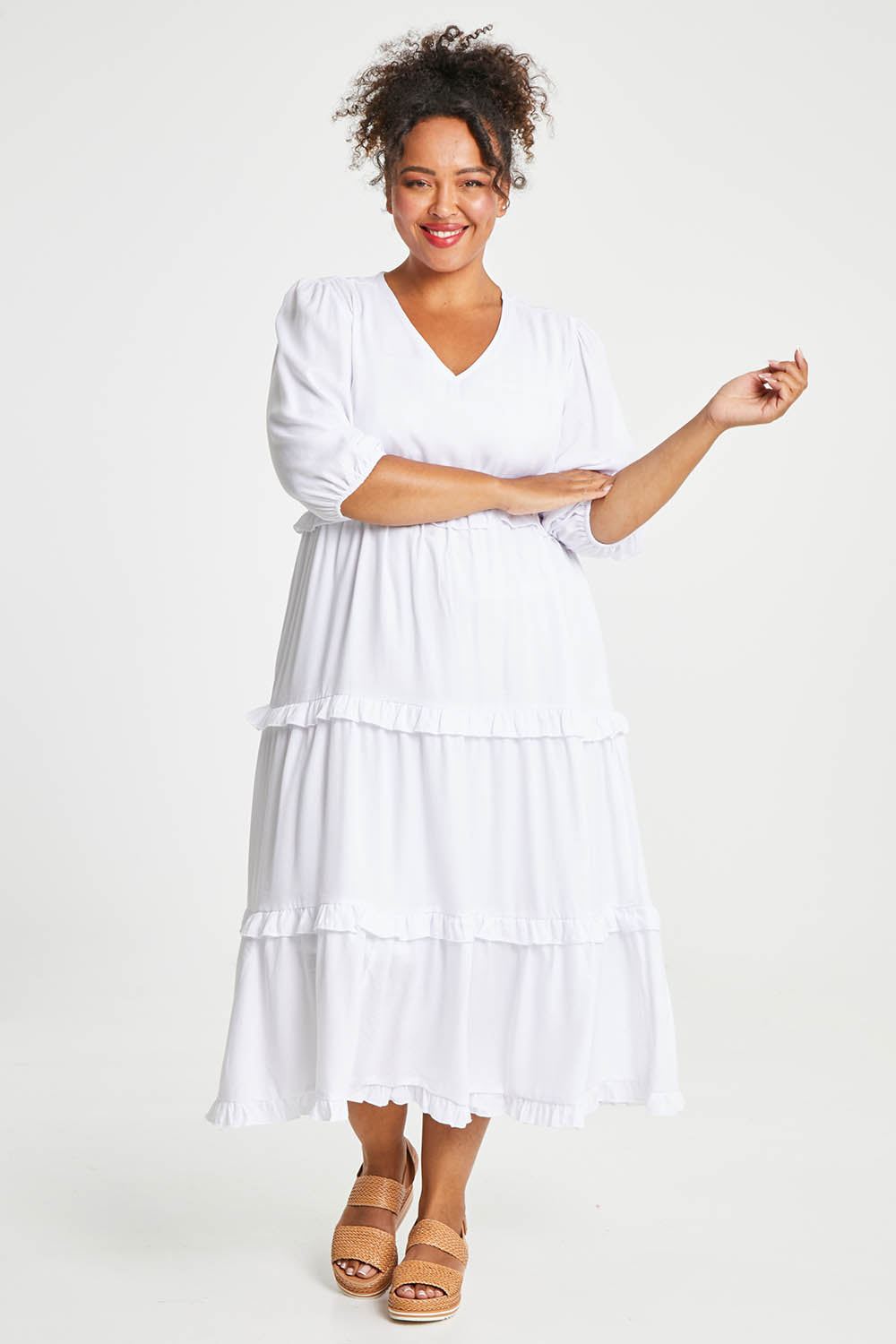 Model Alexis wearing size 16 of the Tiers Of Laughter Maxi Dress in colour White (White), from the front, showing the whole outfit