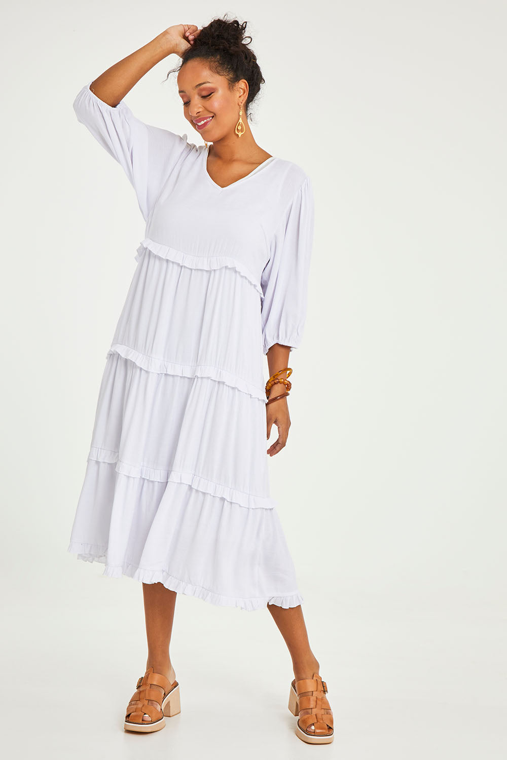 Model Noli wearing size 14 of the Tiers Of Laughter Maxi Dress in colour White (White), from the front, showing the whole outfit