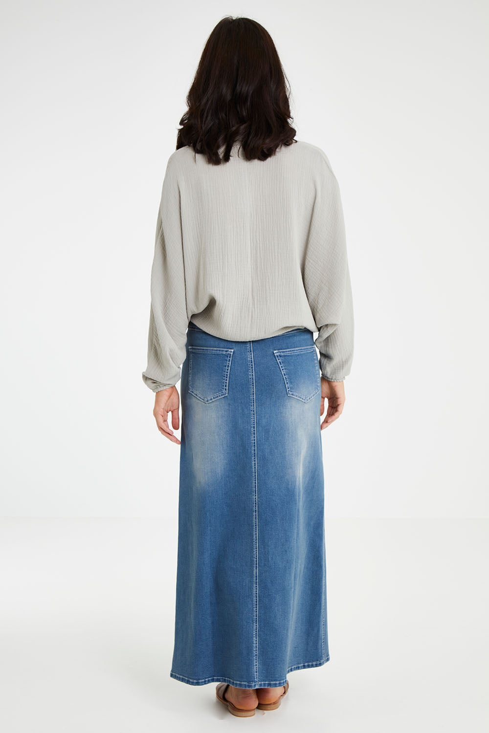 Model Andrea wearing size 10 of the Everyday Cool Cotton Shirt in colour Sage (Green), from the back