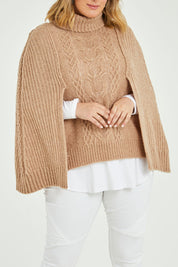 Model Jess wearing size L of the My Obsession Is You Poncho in colour Camel, from the front, cropped image