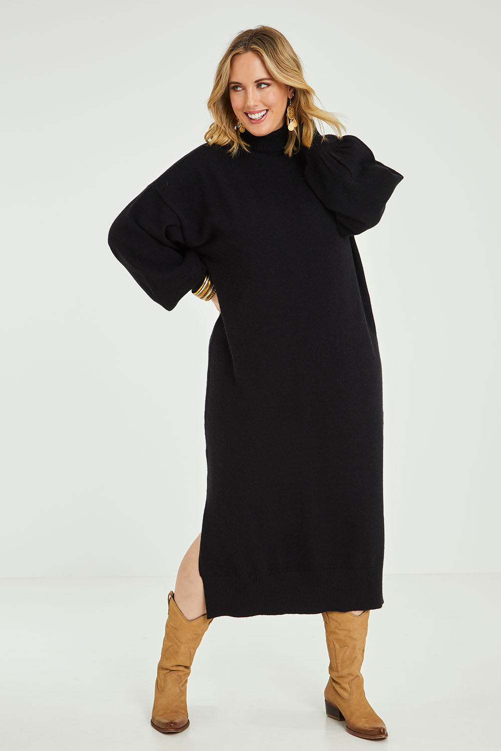 Model Jess wearing size L of the Cool Order Balloon Sleeve Dress in colour Black (Black), from the front, showing the whole outfit