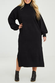 Model Katie wearing size XL of the Cool Order Balloon Sleeve Dress in colour Black (Black), from the front, cropped image
