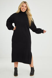 Model Katie wearing size XL of the Cool Order Balloon Sleeve Dress in colour Black (Black), from the front, showing the whole outfit