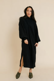 Model Katie wearing size S of the Cool Order Balloon Sleeve Dress in colour Black (Black), from the front, showing the whole outfit