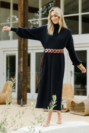Model Tegan wearing size S of the Cool Order Balloon Sleeve Dress in colour Black (Black), from the front, showing the whole outfit