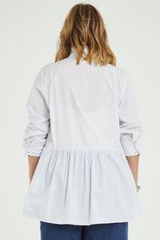 Model Jess wearing size 14 of The Frill You Give Me Blouse in colour White (White), from the back