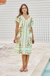Model Tegand wearing size 10 of the Love Shack Midi Dress – Greenfleur in colour Greenfleur, from the front