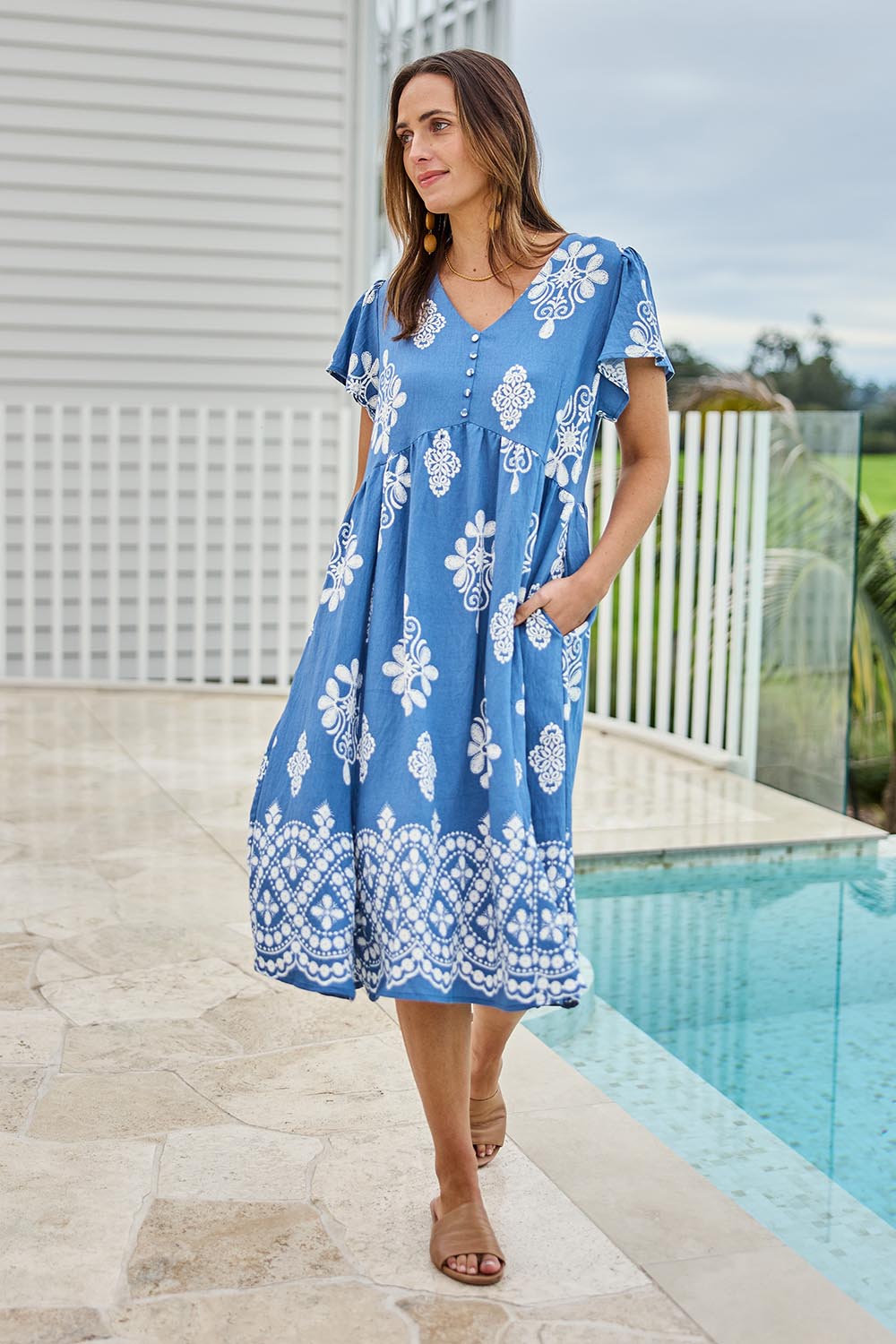 Model Tegand wearing size 10 of the Love Shack Dress - Denimfleur in colour Denimfleur, from the front