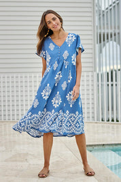 Model Tegand wearing size 10 of the Love Shack Dress - Denimfleur in colour Denimfleur, from the front