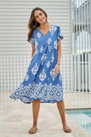 Model Tegand wearing size 10 of the Love Shack Dress - Denimfleur in colour Denimfleur, from the front