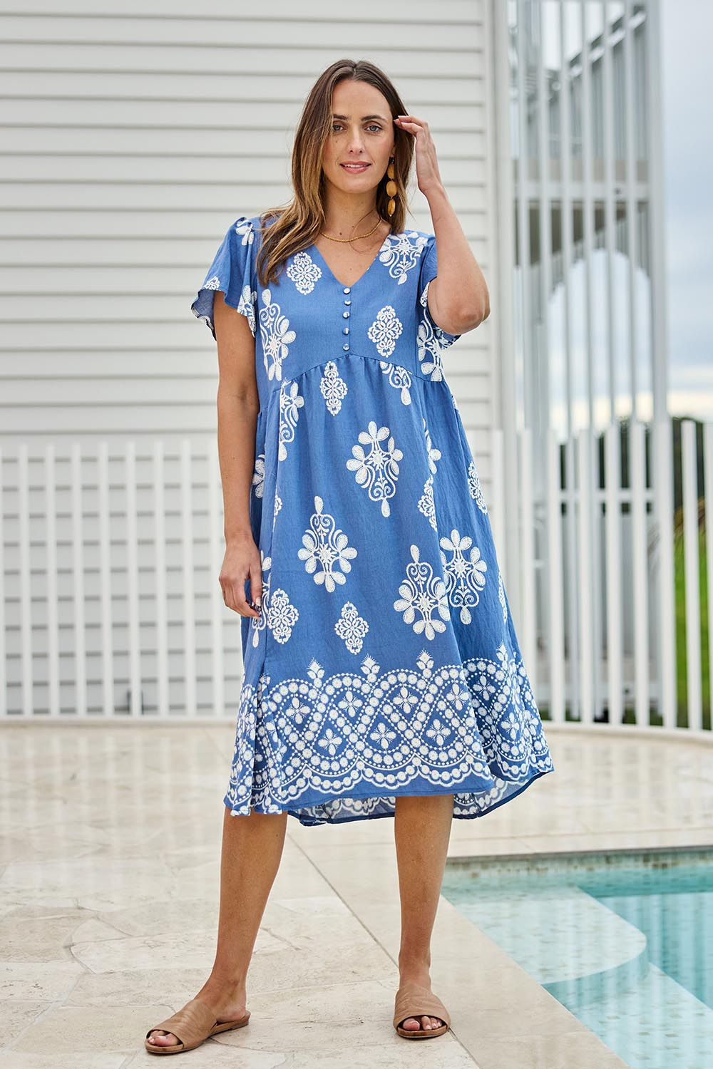 Model Tegand wearing size 10 of the Love Shack Dress - Denimfleur in colour Denimfleur, from the front