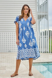 Model Tegand wearing size 10 of the Love Shack Dress - Denimfleur in colour Denimfleur, from the front