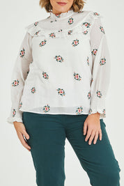 Model Fiona wearing size 16 of the Ruffle My Feathers Blouse in colour Chalk (White), from the front, cropped image