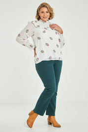 Model Fiona wearing size 16 of the Ruffle My Feathers Blouse in colour Chalk (White), from the front, showing the whole outfit