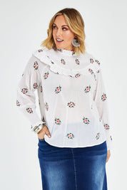 Model Jess wearing size 14 of the Ruffle My Feathers Blouse in colour Chalk (White), from the front, cropped image