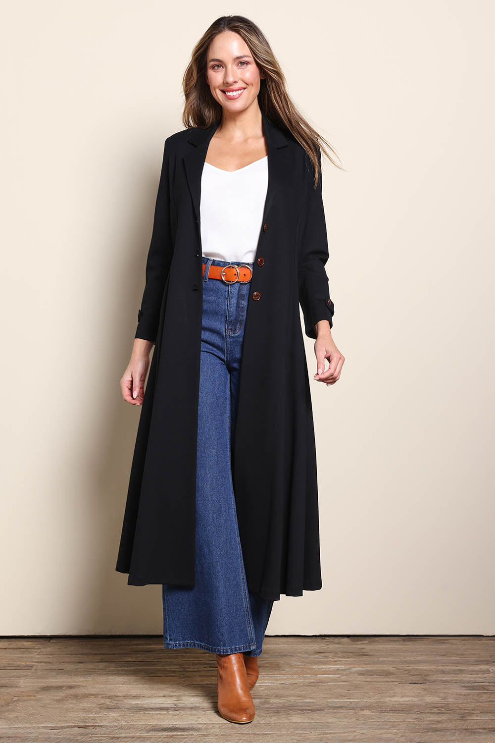 Model Madelinec wearing size 10 of the Meet Me At Midnight Longline Ponte Coat - Black in colour Black, from the front