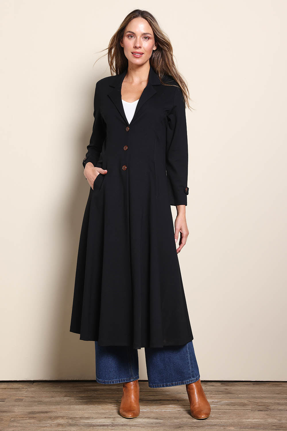 Model Madelinec wearing size 10 of the Meet Me At Midnight Longline Ponte Coat - Black in colour Black, from the front