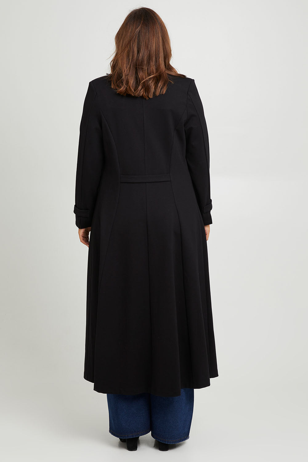 Model Monique wearing size 14 of the Meet Me At Midnight Longline Ponte Coat in colour Black (Black), from the back