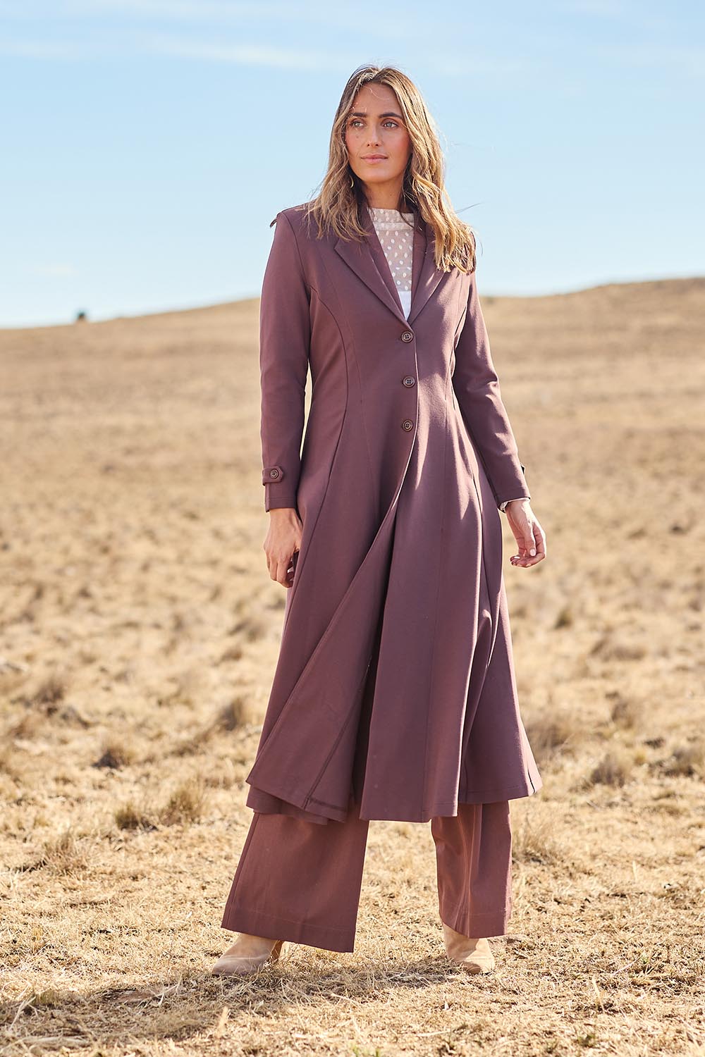 Model Tegan wearing size 10 of the Meet Me At Midnight Longline Ponte Coat in colour Chocolate, from the front, showing the whole outfit