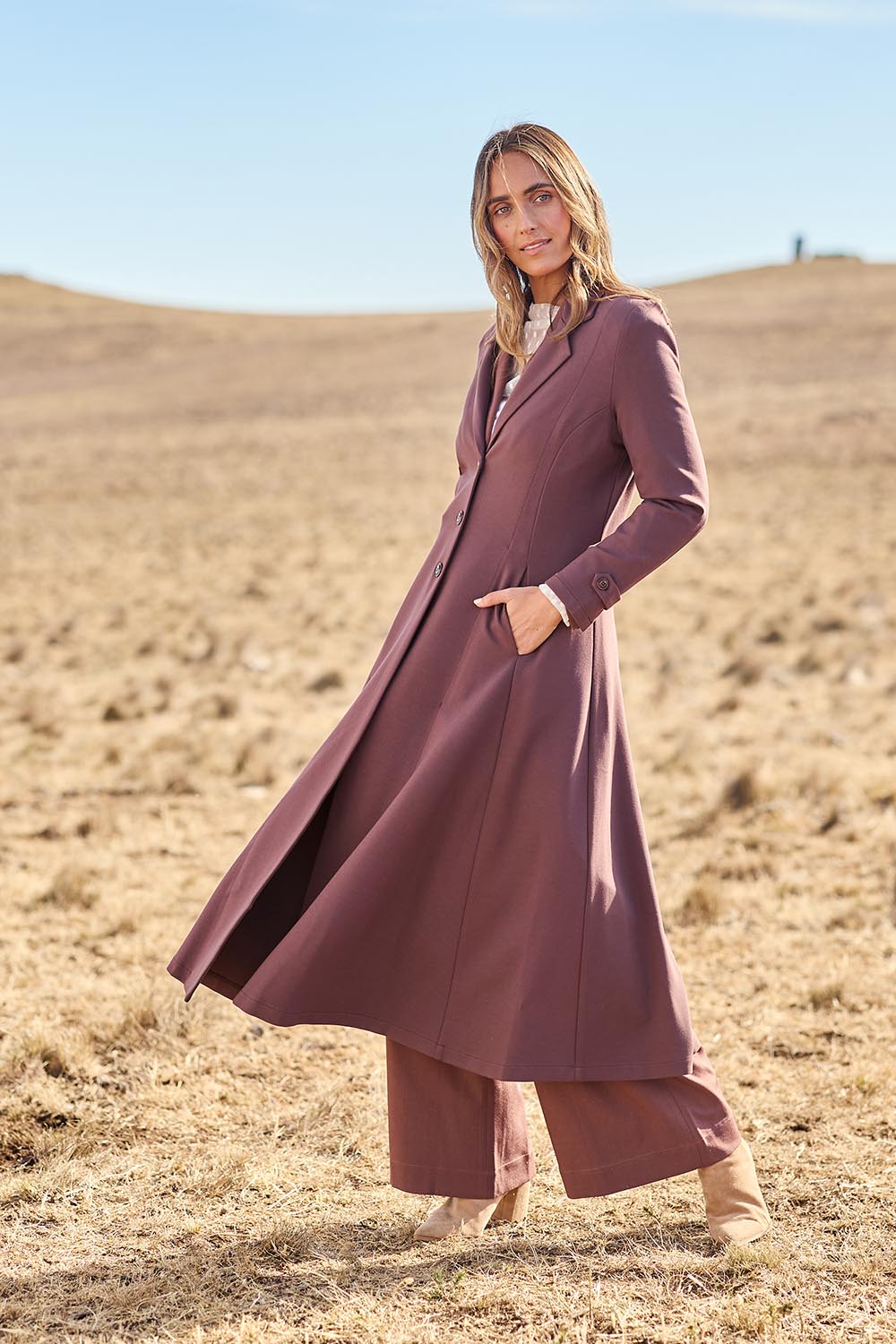 Model Tegan wearing size 10 of the Meet Me At Midnight Longline Ponte Coat in colour Chocolate, from the front, showing the whole outfit