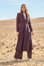 Model Tegand wearing size 10 of the Meet Me At Midnight Longline Ponte Coat - Chocolate in colour Chocolate, from the front