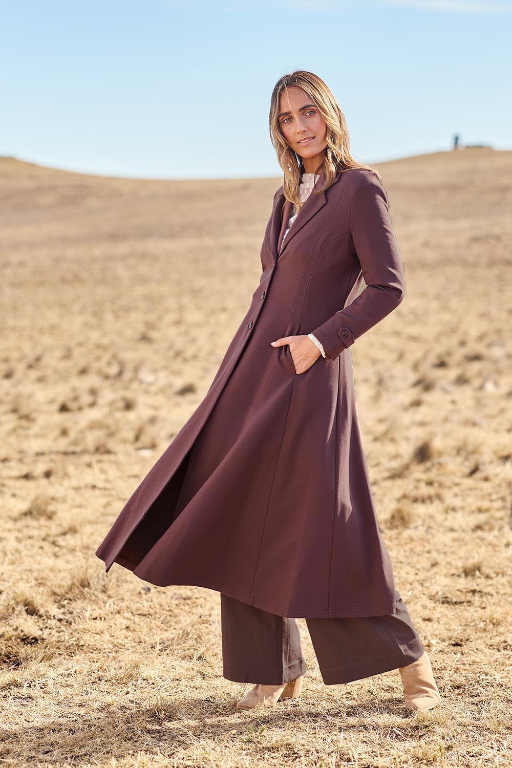 Model Tegand wearing size 10 of the Meet Me At Midnight Longline Ponte Coat - Chocolate in colour Chocolate, from the front