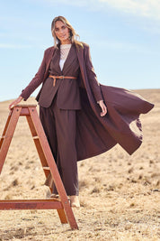 Model Tegand wearing size 10 of the Meet Me At Midnight Longline Ponte Coat - Chocolate in colour Chocolate, from the front