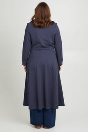 Model Monique wearing size 14 of the Meet Me At Midnight Longline Ponte Coat in colour Frenchblue (Blue), from the back