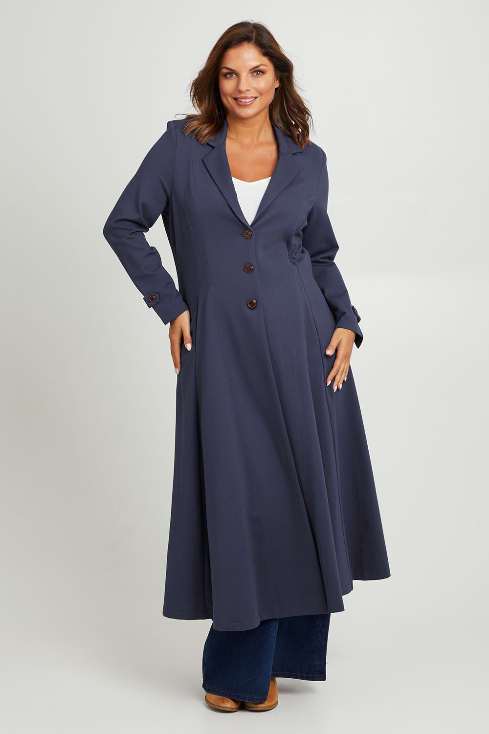 Model Monique wearing size 14 of the Meet Me At Midnight Longline Ponte Coat in colour Frenchblue (Blue), from the front, showing the whole outfit