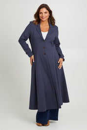 Model Monique wearing size 14 of the Meet Me At Midnight Longline Ponte Coat in colour Frenchblue (Blue), from the front, showing the whole outfit
