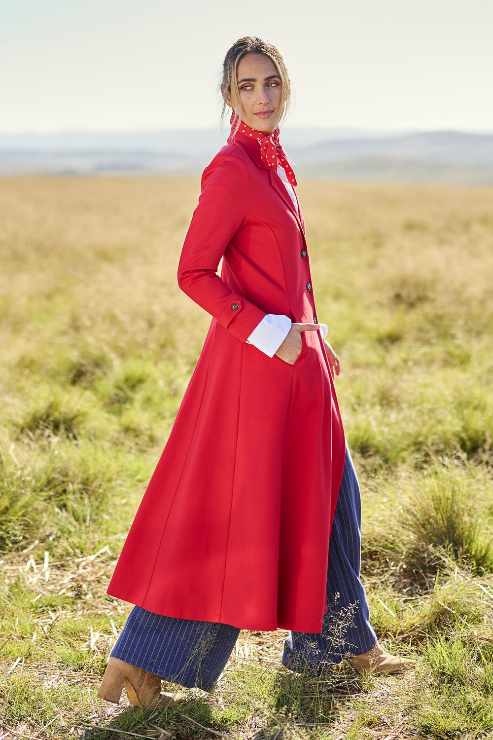 Model Tegan wearing size 10 of the Meet Me At Midnight Longline Ponte Coat in colour Red (Red), from the front, showing the whole outfit