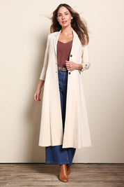 Model Madelinec wearing size 10 of the Meet Me At Midnight Longline Ponte Coat - Sand in colour Sand, from the front