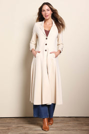 Model Madelinec wearing size 10 of the Meet Me At Midnight Longline Ponte Coat - Sand in colour Sand, from the front