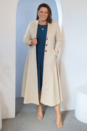 Model Stacey wearing size 14 of the Meet Me At Midnight Longline Ponte Coat in colour Sand, from the front, showing the whole outfit