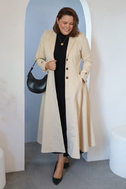 Model Stacey wearing size 14 of the Meet Me At Midnight Longline Ponte Coat in colour Sand, from the front, showing the whole outfit