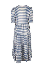 Product shot of the Tiers Of Delight Dress in colour Bluecheck (Blue), from the back