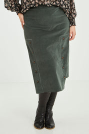Model Jess wearing size 14 of the Smooth Lines Stretch Cord Skirt in colour Khaki (Green), from the front, cropped image