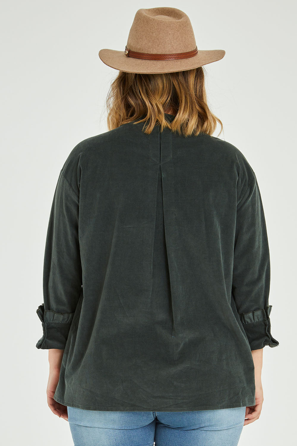 Model Jess wearing size 14 of the Going The Distance Cord Shirt Jacket in colour Khaki (Green), from the back