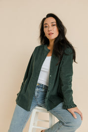 Model Katie wearing size 10 of the Going The Distance Cord Shirt Jacket in colour Khaki (Green), from the front, showing the whole outfit