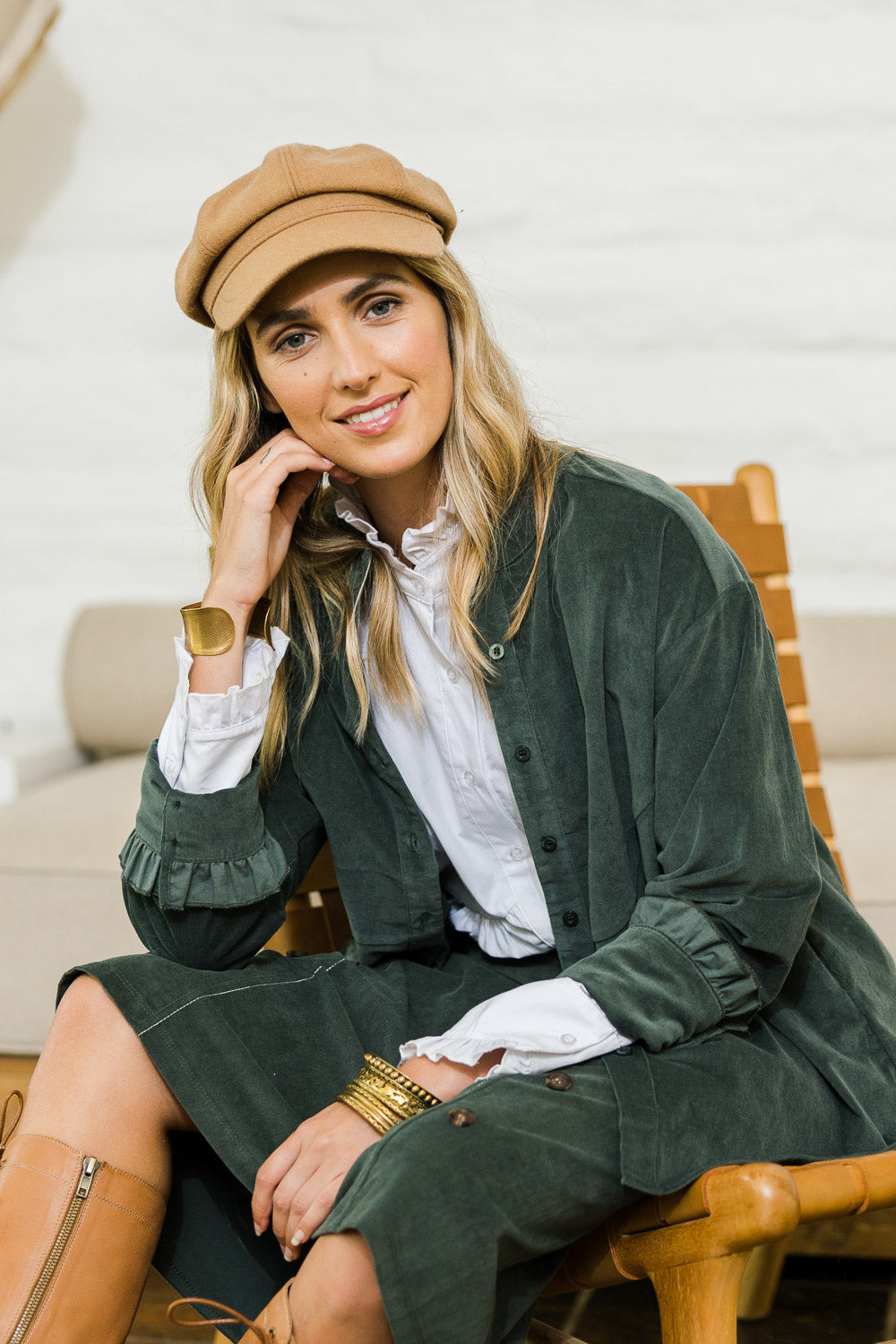 Model Tegan wearing size 10 of the Going The Distance Cord Shirt Jacket in colour Khaki (Green), from the front, showing the whole outfit