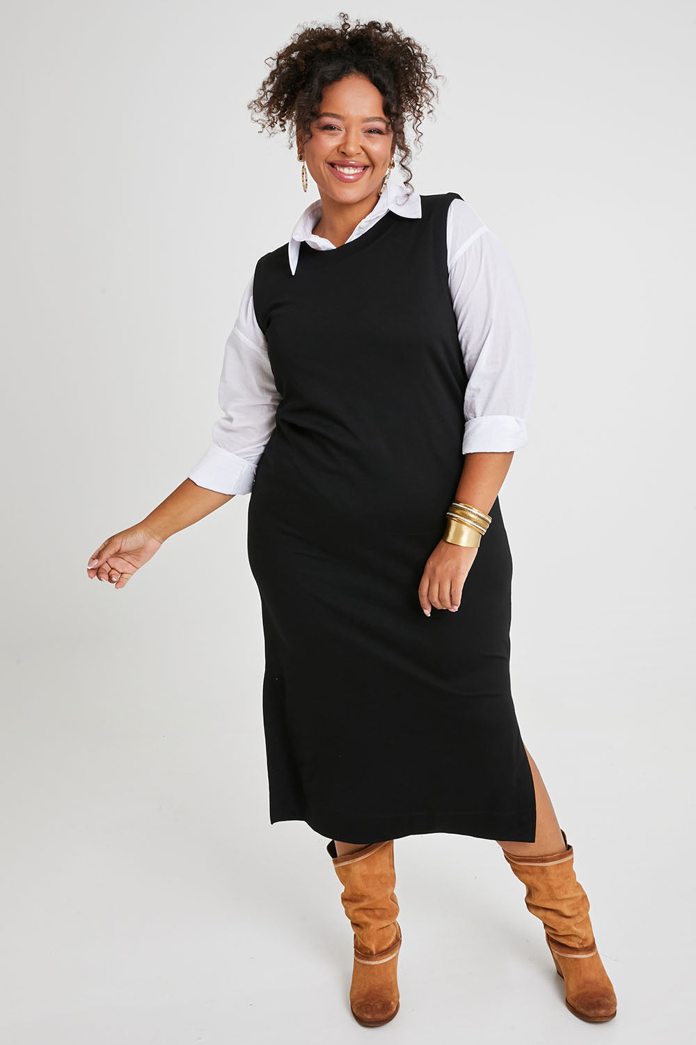 Model Alexis wearing size 16 of the Ready For Anything Tank Dress in colour Black (Black), from the front, showing the whole outfit